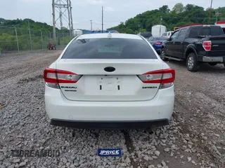 2022 Subaru Impreza Premium with VIN 4S3GKAV69N3610173, listed as a IAAI auction lot 42370952 with 14,363 mi miles and . Bid and sale history available at DreamBid. Image 16.