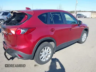 2013 Mazda CX-5 Touring with VIN JM3KE4CE7D0165324, listed as a IAAI auction lot 41879800 with 31,912 mi miles. Bid and sale history available at carsss.com. Image 4.