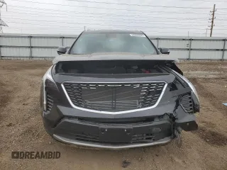 2022 Cadillac XT4 AWD Premium Luxury z VIN 1GYFZDR43NF132553, wystawiony jako Copart lot #50869955 z przebiegiem 25 412 mil mil oraz Szkody całkowita. Historia ofert i sprzedaży dostępna na DreamBid. Obrazek 5.