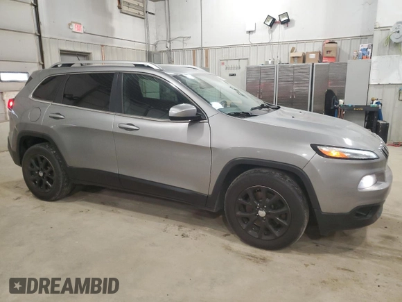 2015 Jeep Cherokee Latitude with VIN 1C4PJLCB7FW759695, listed as a Copart auction lot 50914555 with 225,179 mi miles and Clean Title. Bid and sale history available at DreamBid. Image 4.