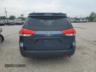 2014 Toyota Sienna XLE with VIN 5TDYK3DC2ES520840, listed as a Copart auction lot 59672295 with 194,143 mi miles and Salvage title. Bid and sale history available at DreamBid. Image 6.