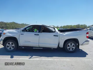 2014 Toyota Tundra 4WD Truck SR5 with VIN 5TFDW5F1XEX390763, listed as a IAAI auction lot 41973864 with 117,369 mi miles. Bid and sale history available at carsss.com. Image 14.