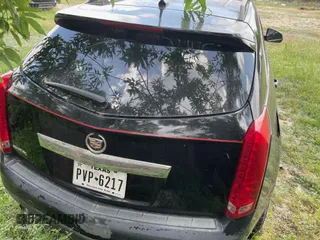 2010 Cadillac SRX z VIN 3GYFNGEY6AS517326, wystawiony jako IAAI lot #42313139 z przebiegiem 181 955 mil mil oraz . Historia ofert i sprzedaży dostępna na DreamBid. Obrazek 14.