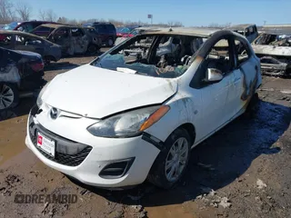 2013 Mazda 2 Sport with VIN JM1DE1KY7D0166470, listed as a IAAI auction lot 41519712 with 117,845 mi miles. Bid and sale history available at carsss.com. Image 2.