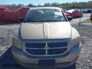 2010 Dodge Caliber SXT with VIN 1B3CB4HA4AD613312, listed as a IAAI auction lot 41746603 with 180,606 mi miles. Bid and sale history available at carsss.com. Image 6.