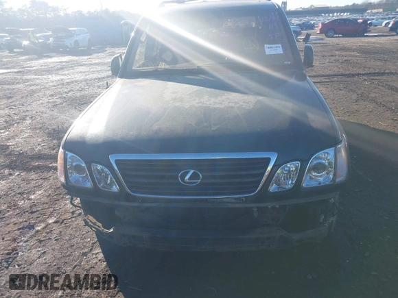 1999 Lexus LX 470 z VIN JT6HT00W9X0031151, wystawiony jako IAAI lot #41436144 z przebiegiem Nie podano mil oraz . Historia ofert i sprzedaży dostępna na DreamBid. Obrazek 6.