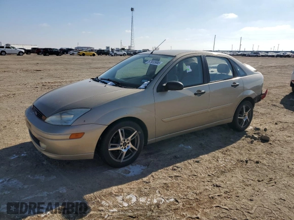 2001 Ford Focus ZTS with VIN 1FAHP383X1W204498, listed as a Copart auction lot 87933995 with 82,555 mi miles and Salvage Title. Bid and sale history available at carsss.com. Image 1.