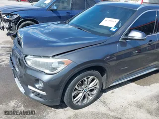 2017 BMW X1 xDrive28i with VIN WBXHT3Z33H4A65198, listed as a IAAI auction lot 41798503 with 88,951 mi miles. Bid and sale history available at carsss.com. Image 17.