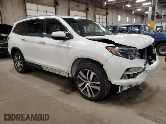 2017 Honda Pilot Elite with VIN 5FNYF6H05HB042234, listed as a Copart auction lot 51813235 with 124,950 mi miles and Salvage Title. Bid and sale history available at DreamBid. Image 4.