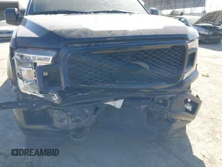 2018 Ford F-150 XL with VIN 1FTEW1E50JKE13640, listed as a IAAI auction lot 41228537 with 146,927 mi miles. Bid and sale history available at carsss.com. Image 6.