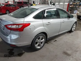 2014 Ford Focus SE with VIN 1FADP3F29EL160834, listed as a IAAI auction lot 41597552 with 118,410 mi miles. Bid and sale history available at carsss.com. Image 4.