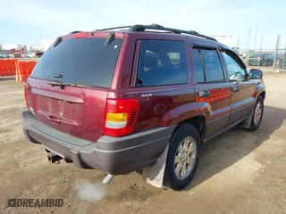 2001 Jeep Grand Cherokee Laredo with VIN 1J4GW48SX1C508609, listed as a IAAI auction lot 41780729 with 144,796 mi miles. Bid and sale history available at carsss.com. Image 4.
