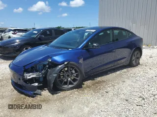 2023 Tesla Model 3 z VIN 5YJ3E1EA1PF384422, wystawiony jako Copart lot #61971365 z przebiegiem 39 689 mil mil oraz Nie do naprawy • Non repairable. Historia ofert i sprzedaży dostępna na DreamBid. Obrazek 1.