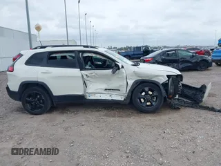 2019 Jeep Cherokee Latitude Plus with VIN 1C4PJLLBXKD405322, listed as a IAAI auction lot 41708104 with 93,295 mi miles and . Bid and sale history available at DreamBid. Image 13.