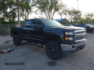 2015 Chevrolet Silverado 1500 LT with VIN 1GCVKREC3FZ241773, listed as a IAAI auction lot 42054178 with 146,304 mi miles. Bid and sale history available at carsss.com. Image 1.