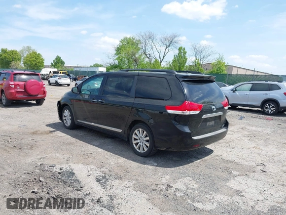 2011 Toyota Sienna XLE with VIN 5TDDK3DC2BS024429, listed as a IAAI auction lot 42091570 with 159,398 mi miles and . Bid and sale history available at DreamBid. Image 3.