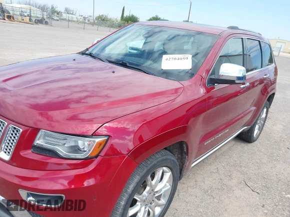 2014 Jeep Grand Cherokee Summit z VIN 1C4RJFJT4EC423217, wystawiony jako IAAI lot #42704059 z przebiegiem 245 928 mil mil oraz . Historia ofert i sprzedaży dostępna na DreamBid. Obrazek 6.