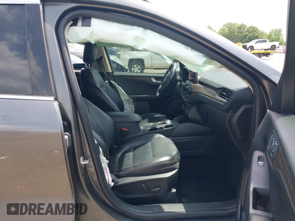 2020 Ford Escape Titanium with VIN 1FMCU9J94LUB19570, listed as a IAAI auction lot 42134031 with 110,248 mi miles and . Bid and sale history available at DreamBid. Image 5.