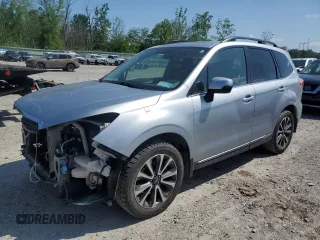2017 Subaru Forester Touring с VIN JF2SJGTC9HH425302, выставлен на аукционе Copart как лот 61482515 с пробегом 144 588 миль миль и Списание • Salvage title. История ставок и продаж доступна на DreamBid. Изображение 1.