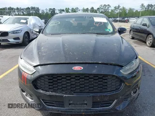 2016 Ford Fusion Titanium with VIN 3FA6P0K90GR179528, listed as a IAAI auction lot 42181213 with 230,264 mi miles. Bid and sale history available at carsss.com. Image 12.