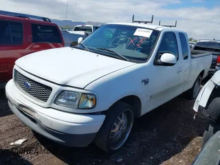 2001 Ford F-150 XL z VIN 1FTRX17L31NA79032, wystawiony jako IAAI lot #42334280 z przebiegiem Nie podano mil oraz . Historia ofert i sprzedaży dostępna na DreamBid. Obrazek 2.