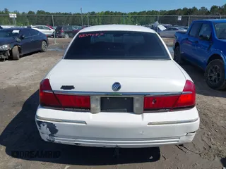 2000 Mercury Grand Marquis LS z VIN 2MEFM75W3YX689323, wystawiony jako IAAI lot #42019687 z przebiegiem 241 045 mil mil oraz . Historia ofert i sprzedaży dostępna na DreamBid. Obrazek 16.