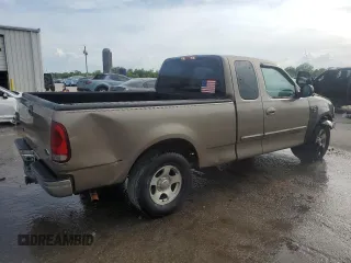 2003 Ford F-150 XL with VIN 1FTRX17LX3NA38576, listed as a Copart auction lot 54057495 with 173,811 mi miles and Salvage title. Bid and sale history available at DreamBid. Image 3.