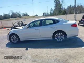 2011 Infiniti M with VIN JN1BY1AP8BM325061, listed as a IAAI auction lot 41765214 with 289,990 mi miles and . Bid and sale history available at DreamBid. Image 14.
