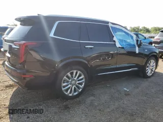 2020 Cadillac XT6 FWD Premium Luxury с VIN 1GYKPCRSXLZ174002, выставлен на аукционе Copart как лот 52083235 с пробегом 79 712 миль миль и Списание • Salvage title. История ставок и продаж доступна на DreamBid. Изображение 3.