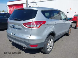 2013 Ford Escape SE with VIN 1FMCU9GX5DUB17091, listed as a IAAI auction lot 42047494 with 137,500 mi miles and . Bid and sale history available at DreamBid. Image 4.