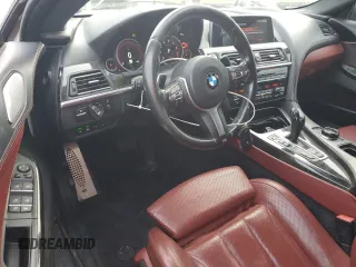 2017 BMW 6 Series 650i with VIN WBA6D4C54HD977706, listed as a Copart auction lot 79116554 with 87,039 mi miles and Salvage Title. Bid and sale history available at carsss.com. Image 8.