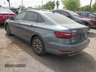 2021 Volkswagen Jetta S z VIN 3VWC57BU0MM032910, wystawiony jako IAAI lot #41836545 z przebiegiem 64 042 mil mil oraz . Historia ofert i sprzedaży dostępna na DreamBid. Obrazek 3.