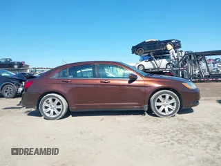 2013 Chrysler 200 Touring with VIN 1C3CCBBB9DN550812, listed as a IAAI auction lot 41677254 with 172,873 mi miles and . Bid and sale history available at carsss.com. Image 13.