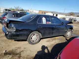 1994 Toyota Camry XLE with VIN JT2GK13E9R0057812, listed as a Copart auction lot 88704015 with 153,621 mi miles and Salvage Title. Bid and sale history available at carsss.com. Image 3.