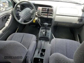 2002 Suzuki Grand Vitara JS z VIN JS3TE62V924151538, wystawiony jako Copart lot #58900085 z przebiegiem 130 514 mil mil oraz Szkoda całkowita • Salvage title. Historia ofert i sprzedaży dostępna na DreamBid. Obrazek 8.