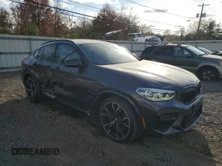 2020 BMW X4 M Competition z VIN 5YMUJ0C05L9B57303, wystawiony jako Copart lot #79167294 z przebiegiem 56 584 mil mil oraz Szkoda całkowita • Salvage title. Historia ofert i sprzedaży dostępna na DreamBid. Obrazek 4.