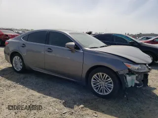 2015 Lexus ES with VIN JTHBK1GG8F2186426, listed as a Copart auction lot 54627415 with 136,929 mi miles and Clean Title. Bid and sale history available at carsss.com. Image 4.