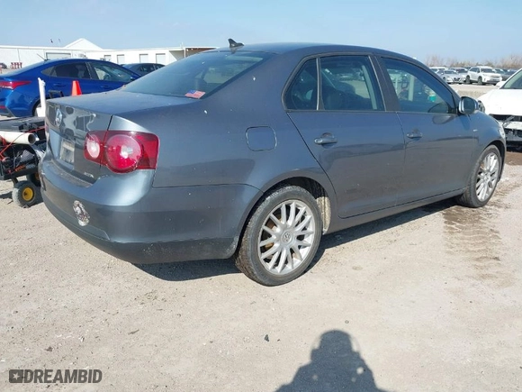 2008 Volkswagen Jetta Sedan Wolfsburg with VIN 3VWRJ71K98M196183, listed as a IAAI auction lot 41512701 with 95,231 mi miles. Bid and sale history available at carsss.com. Image 4.