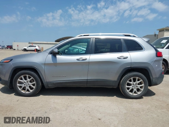 2016 Jeep Cherokee 75th Anniversary with VIN 1C4PJLCB3GW200355, listed as a IAAI auction lot 42140746 with 136,357 mi miles and . Bid and sale history available at DreamBid. Image 14.