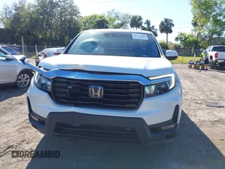2021 Honda Ridgeline RTL-E with VIN 5FPYK3F7XMB011525, listed as a IAAI auction lot 41774012 with 98,031 mi miles and . Bid and sale history available at DreamBid. Image 12.