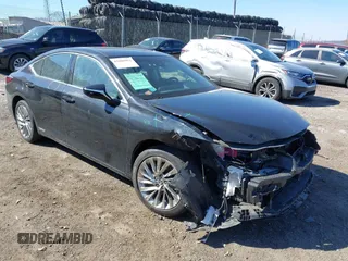 2021 Lexus ES 300h Luxury with VIN 58AEA1C15MU011530, listed as a IAAI auction lot 41686962 with 39,343 mi miles and . Bid and sale history available at DreamBid. Image 1.