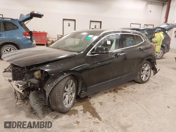 2020 BMW X2 xDrive28i z VIN WBXYJ1C00L5R79711, wystawiony jako IAAI lot #41051383 z przebiegiem Nie podano mil oraz . Historia ofert i sprzedaży dostępna na DreamBid. Obrazek 16.