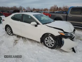 2019 Toyota Camry LE with VIN 4T1B11HK2KU818757, listed as a Copart auction lot 45773145 with 106,210 mi miles and Salvage Title. Bid and sale history available at carsss.com. Image 4.