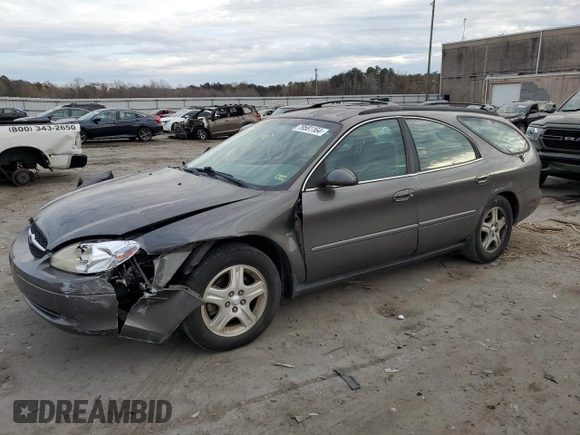 2002 Ford Taurus with VIN 1FAFP59S62A256119, listed as a Copart auction lot 79581164 with 57,128 mi miles and Clean title. Bid and sale history available at DreamBid. Image 1.