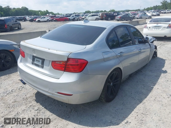 2013 BMW 3 Series 328i with VIN WBA3A5C54DF601944, listed as a IAAI auction lot 42430888 with 137,843 mi miles and . Bid and sale history available at DreamBid. Image 4.