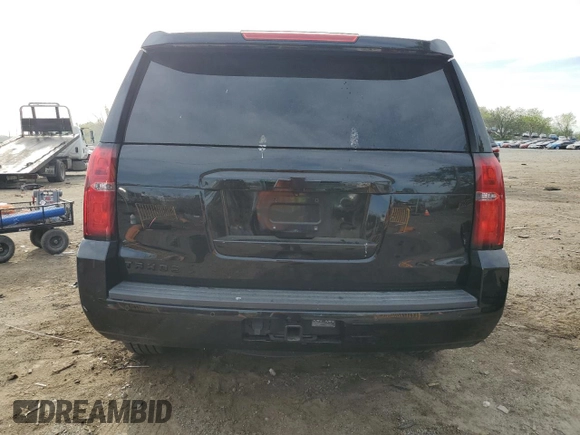 2018 Chevrolet Tahoe LS z VIN 1GNSKAKC8JR215839, wystawiony jako Copart lot #52627955 z przebiegiem 96 380 mil mil oraz Szkoda całkowita • Salvage title. Historia ofert i sprzedaży dostępna na DreamBid. Obrazek 6.