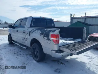 2014 Ford F-150 XL with VIN 1FTFW1CF2EKD03260, listed as a IAAI auction lot 41601219 with 147,306 mi miles. Bid and sale history available at carsss.com. Image 3.