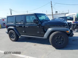 2020 Jeep Wrangler Unlimited Freedom with VIN 1C4HJXDG0LW238819, listed as a IAAI auction lot 42139357 with 67,619 mi miles and . Bid and sale history available at DreamBid. Image 13.
