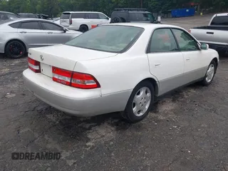2001 Lexus ES 300 z VIN JT8BF28G410307451, wystawiony jako IAAI lot #42369871 z przebiegiem 290 620 mil mil oraz . Historia ofert i sprzedaży dostępna na DreamBid. Obrazek 4.