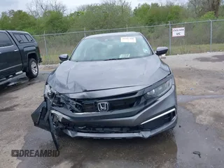 2019 Honda Civic LX with VIN 19XFC2F68KE007409, listed as a IAAI auction lot 41887406 with 57,147 mi miles and . Bid and sale history available at DreamBid. Image 12.